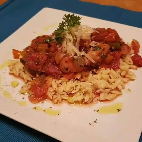 Chicken, Sausage, Peppers and Onions over Orzo