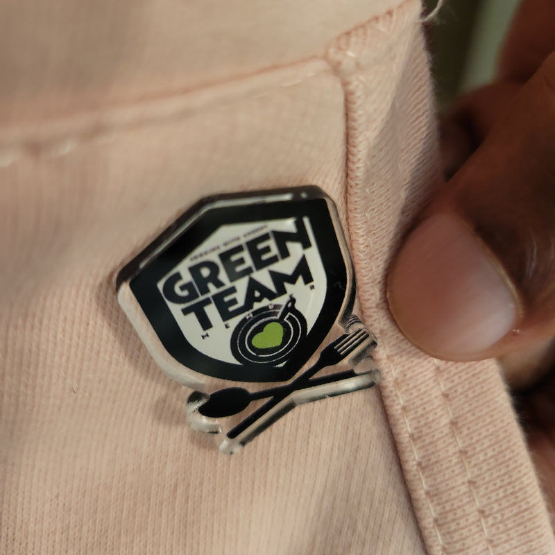 Green team lapel pin